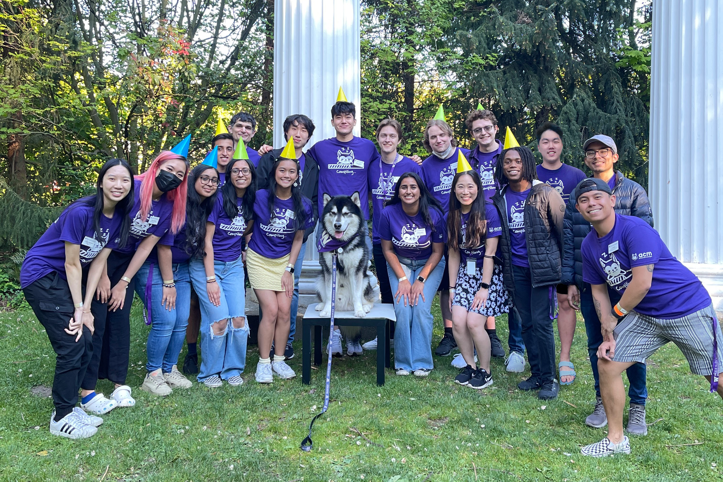 Group photo of ACM officers (2022) with Dubs, the UW husky mascot.